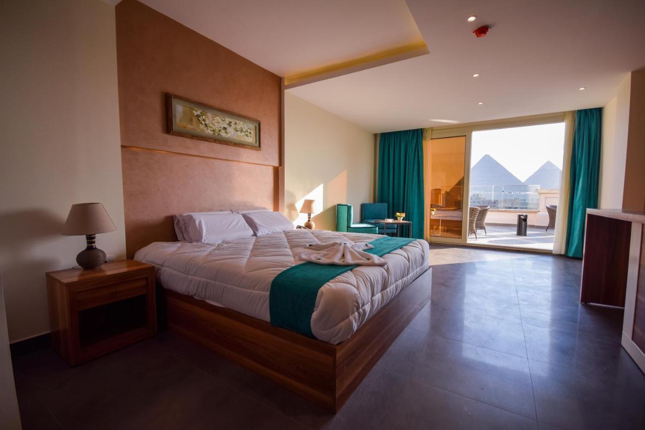 New Pyramid Quen Hotel Cairo Exterior photo