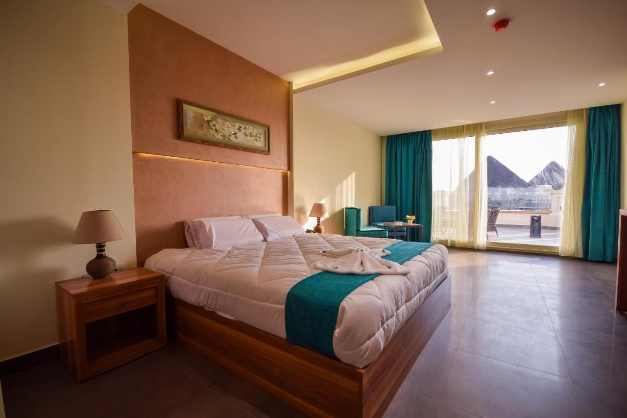 New Pyramid Quen Hotel Cairo Exterior photo