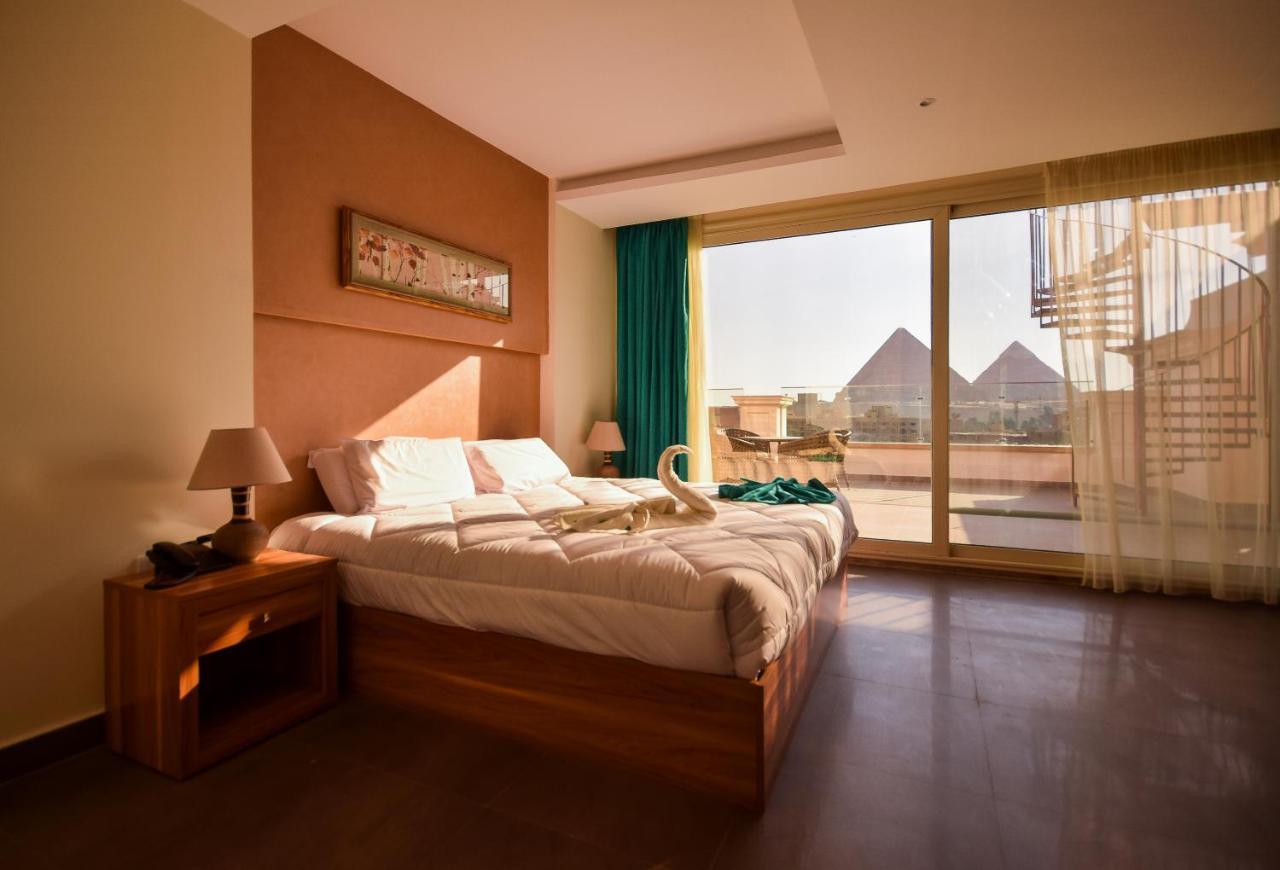 New Pyramid Quen Hotel Cairo Exterior photo
